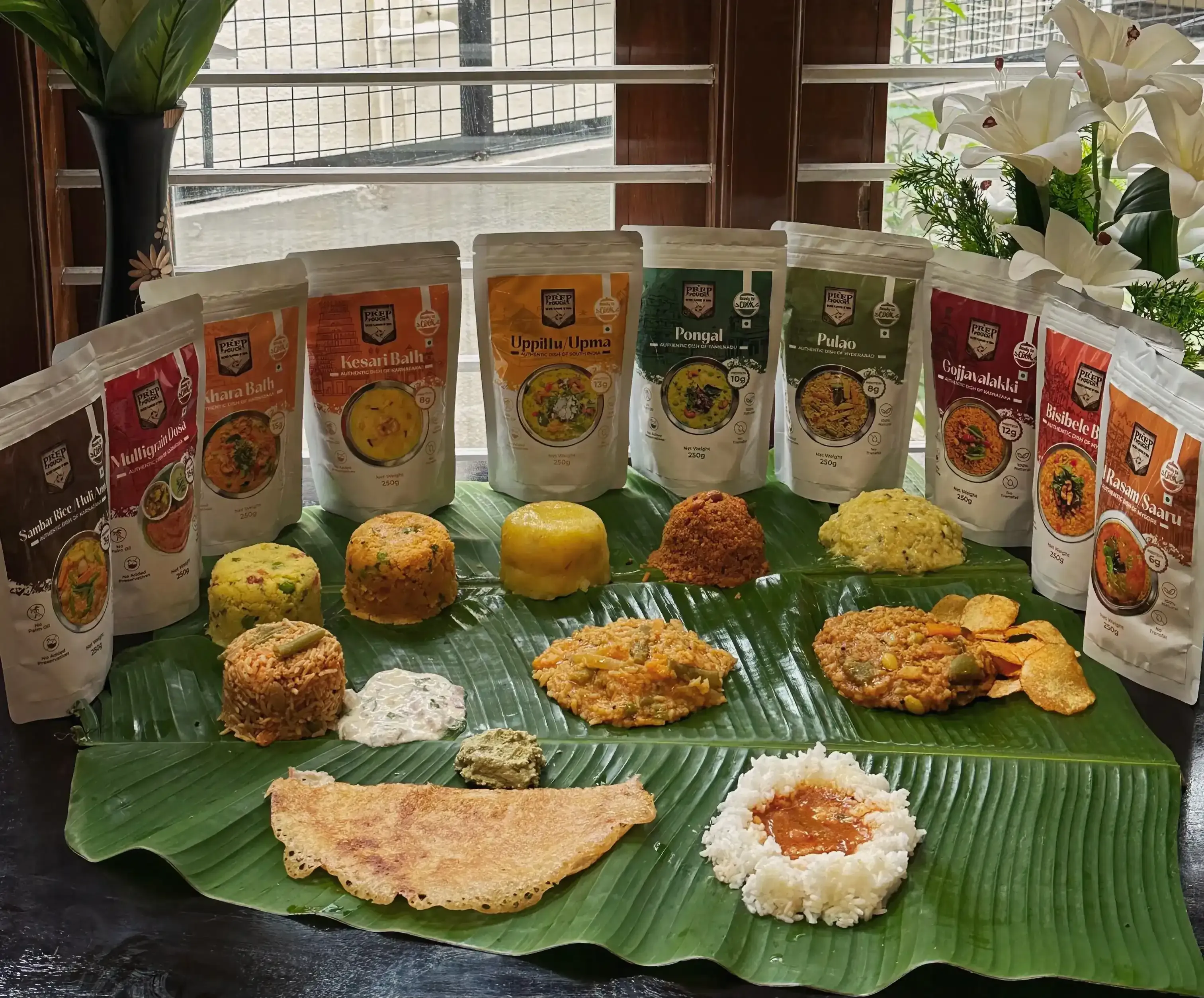 Traditional South Indian kitchen scene showing authentic cooking methods and ingredients used in Prep Pouch products